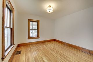 Don't miss the light-fixture - a lovely mid-century modern addition.