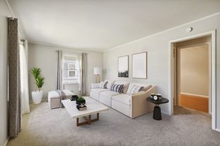 with great east and south windows to bring in morning light and leads to the  Formal Dining Room ~ Virtually Staged