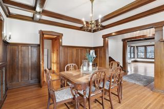 9' beamed ceilings and paneled walls