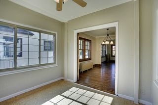 Gentle breezes find their way in through generous sun porch windows. 