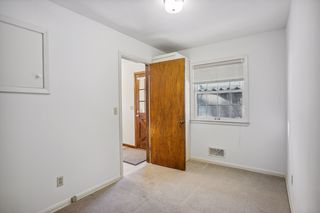 Third bedroom or flex room for office, den or kids playroom on the main floor