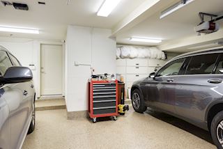 Two car tuckunder garage with exception storage