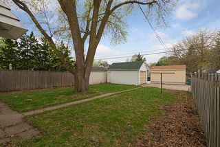Backyard, looking toward garage/alley.