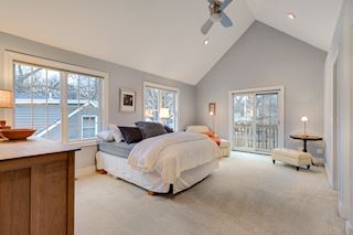 The Master Bedroom is a terrific retreat with vaulted ceilings, large windows and expansive space