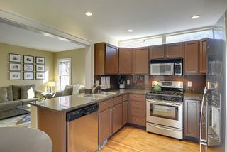 The Updated Kitchen opens to the Light-Filled Living Room