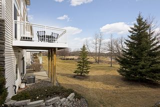 Enjoy watching the golfers from your deck off the kitchen or your lower level patio