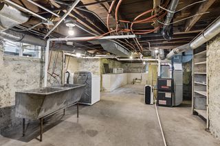 Each unit has separate newer furnace, electric panel, water heater and separate electric & gas meters