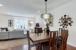 This is the family room - note the recessed lighting. Private views out the windows. The entire home has white trim and doors.