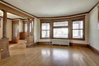 The Living Room features a Large Bay Window with Leaded Glass Windows above...