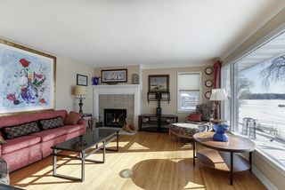 Living room with large picture window to take in the lake views