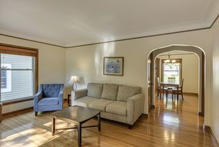 Light and bright and open with gleaming hardwood floors...