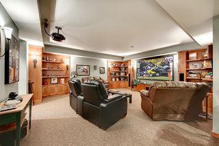 This space is designed for Theatre viewing, complete surround sound, drop theatre screen, and maximum seating area.