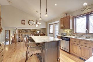 Tile and Slate Backsplash and newer Light Fixtures!