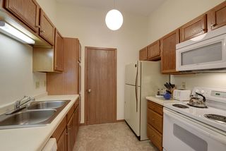 Nicely sized galley kitchen leading to your own laundry and mechanical room