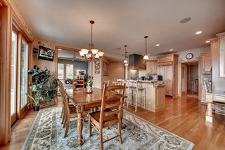 Maple cabinetry, white oak flooring, maple woodwork highlight the many species of hardwoods in the home.