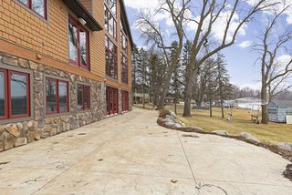 The patio runs the full width of the house.
