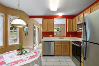 Cut out over kitchen sink allows natural light to flow through.