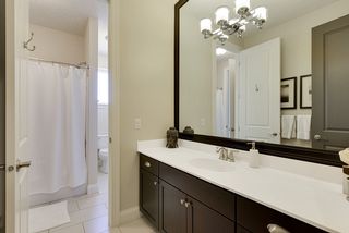 Main upper level bath with walk-thru to guest bedroom...