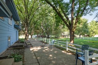 The Kitchen walks out to a 40 x 12 foot outdoor Patio with firepit area.  The backyard has partial fencing, and plenty of room to relax 
and enjoy time with family and friends.