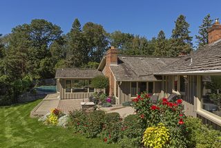 Beautiful manicured lawn with Hosta & Peonies