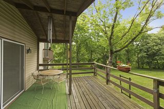 Deck off of living room - would make for a lovely 3- or 4-season porch!