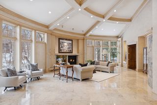 Vaulted Living Room with a Beautiful Beamed Ceiling.