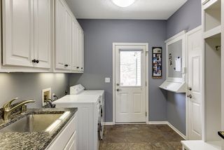 Newly upgraded mudroom with 2nd entrance, lockers and custom charging station