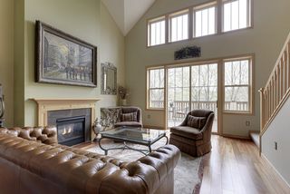 Gas fireplace - beautiful, gleaming, hardwood floors. 
