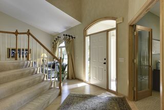 2 story entry way with access to formal living room and Den