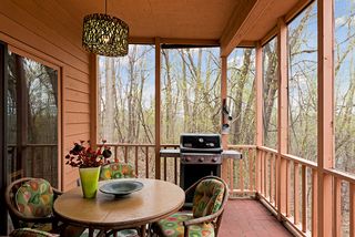 Enjoy barbecuing on the screened porch...