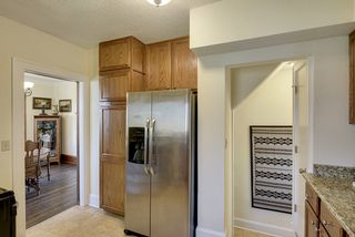 The Kitchen offers easy "Side Door" access to the Back Yard & Basement...