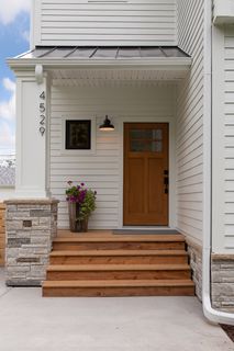 Covered porch and attractive entry