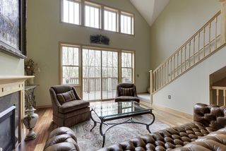 Views of Nine Mile Creek out of two story windows. 