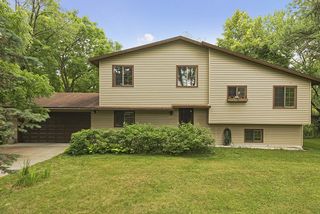 Beautiful home with a new garage door and newer siding & roof (~2011).
