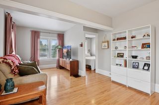 Another View of Living room in Apt #3.
Features Refinished Hardwood floors all newer vinyl windows throughout.