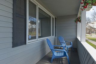Front porch has a great view of the park across the street. 