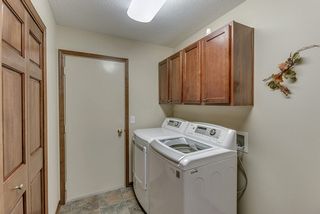 Entry to garage and laundry with ample cleaning and coat storage closets. 