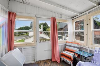 View of Private Porch from Apt #4.
Features New Vinyl Windows, Storm Door, Hardwood flooring.
Leads out to new Staircase to street level.