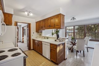 Kitchen is open to the living and dining areas.