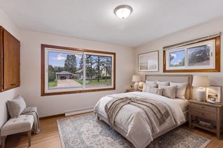 Virtually staged — main-level bedroom