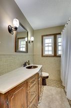 The 2nd Floor Bathroom features Vintage Ceramic Tile...