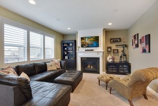 Main floor Great Room with gas fireplace, and media wiring.