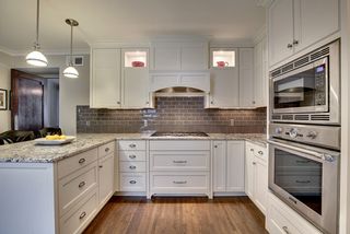 You will also find Hardwood Floors, Granite Countertops, Thermador Double Ovens and Gas Cook-Top.