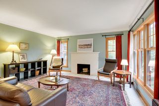 Another view of the spacious Living Room with Fireplace....