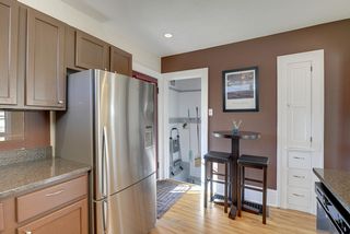 The updated Kitchen features Granite Countertops & Hardwood Floors