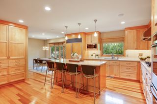 Gourmet Kitchen with custom maple cabinetry  