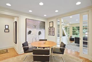 Informal dining leads to more storage, half bath and french door entry into the main floor Master Suite!he 