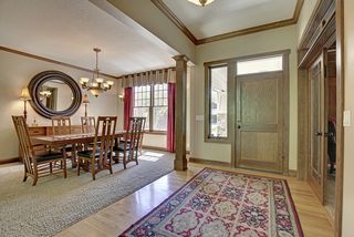Open, inviting Entry, Den and Dining Room.