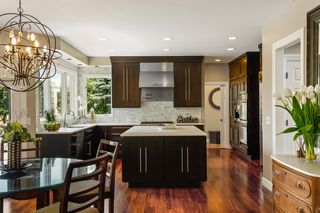 Cabinets are maple wood with stainless hardware