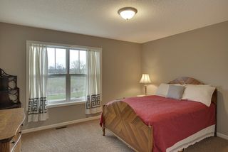 Bedroom 4 on the 2nd floor has a view of the front of the open wetland area across the street